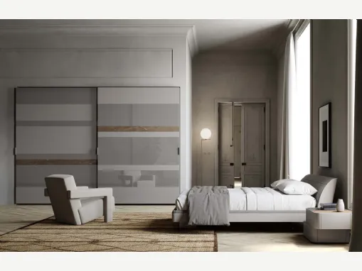 Armadio con ante scorrevoli laccato opaco Elite con fasce in Vetro e Ceramica di Voltan