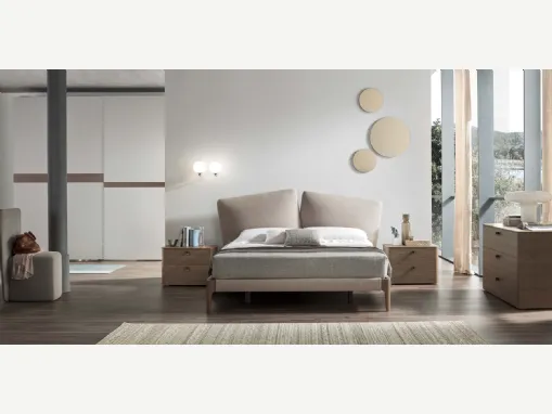 Letto in tessuto con testiera imbottita formata da due ampi e morbidi cuscini che insieme evocano la forma di un cuore Love di Maronese Acf