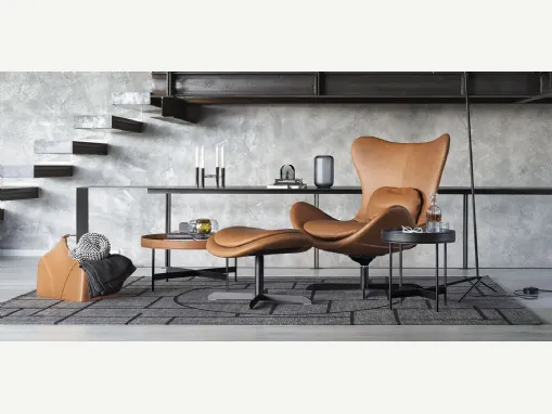 Poltrona Relax in pelle con base in metallo girevole e basculante con pouf Lazy Calligaris