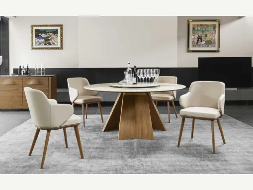 Tavolo rotondo con piano in ceramica e basamento in legno Icaro di Calligaris